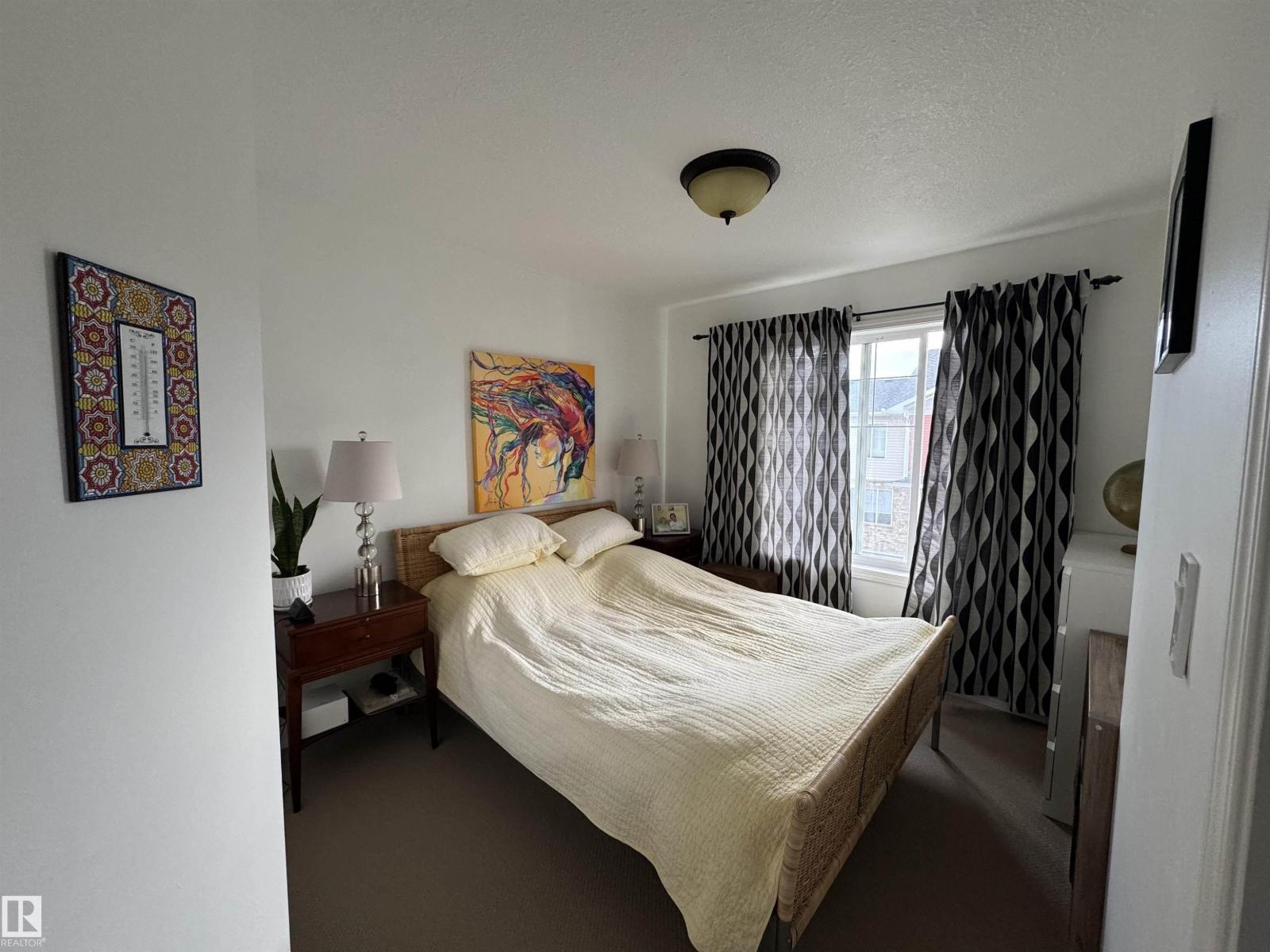 #208 178 Bridgeport Bv, Leduc, AB - Indoor Photo Showing Bedroom