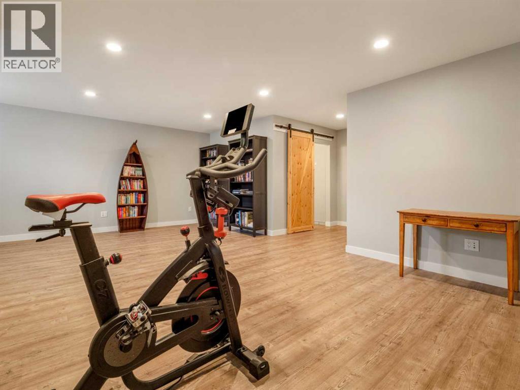 166 Crocus Terrace W, Lethbridge, AB - Indoor Photo Showing Gym Room