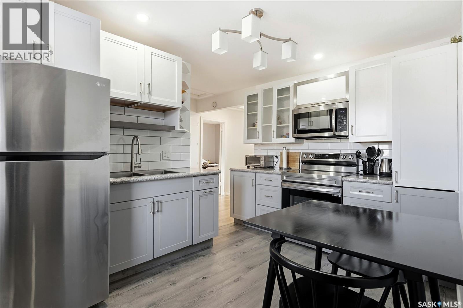 4124 4Th Avenue, Regina, SK - Indoor Photo Showing Kitchen With Stainless Steel Kitchen With Double Sink