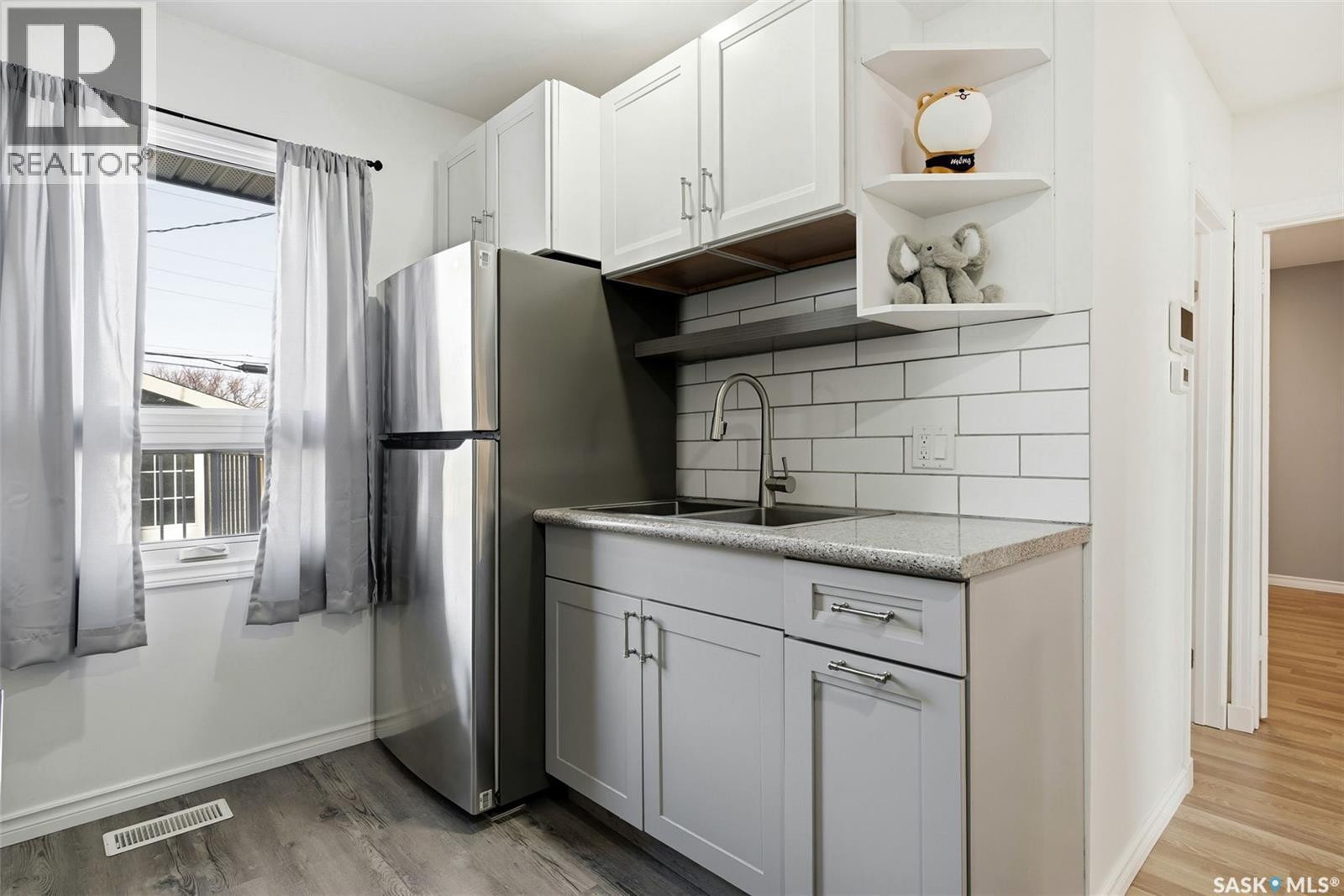 4124 4Th Avenue, Regina, SK - Indoor Photo Showing Kitchen With Double Sink