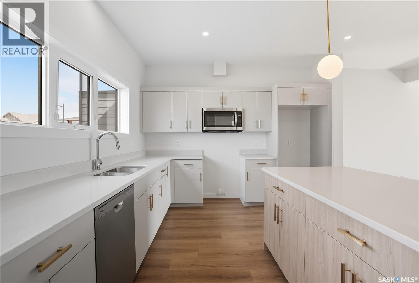 70 Taskamanwa Terrace, Saskatoon, SK - Indoor Photo Showing Kitchen With Double Sink