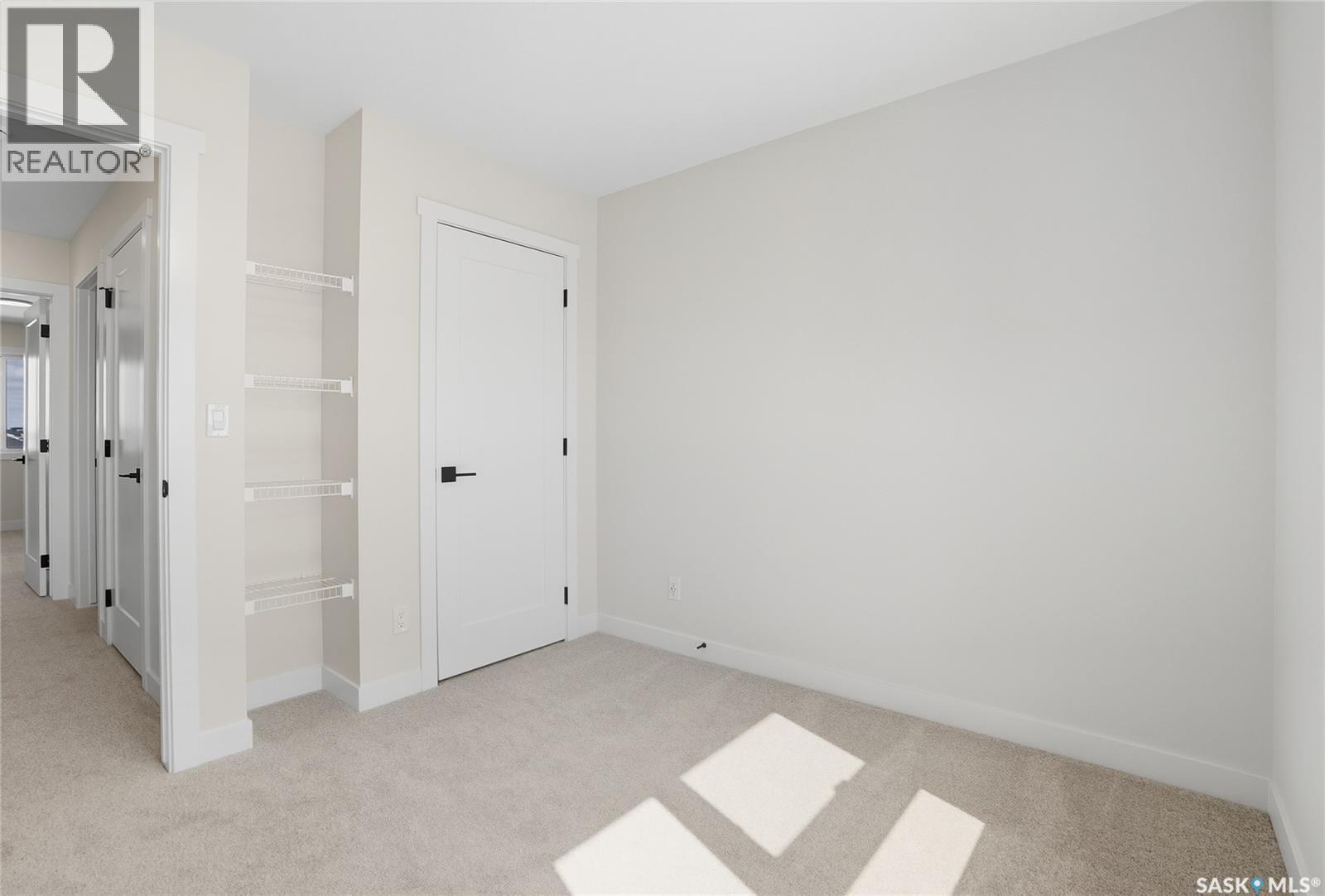 70 Taskamanwa Terrace, Saskatoon, SK - Indoor Photo Showing Other Room