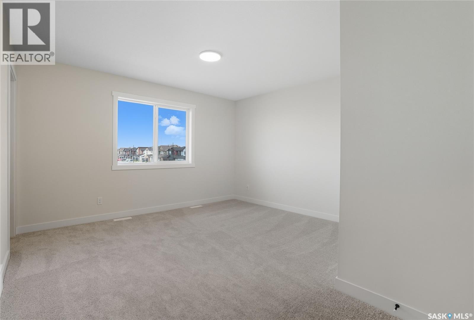 70 Taskamanwa Terrace, Saskatoon, SK - Indoor Photo Showing Other Room