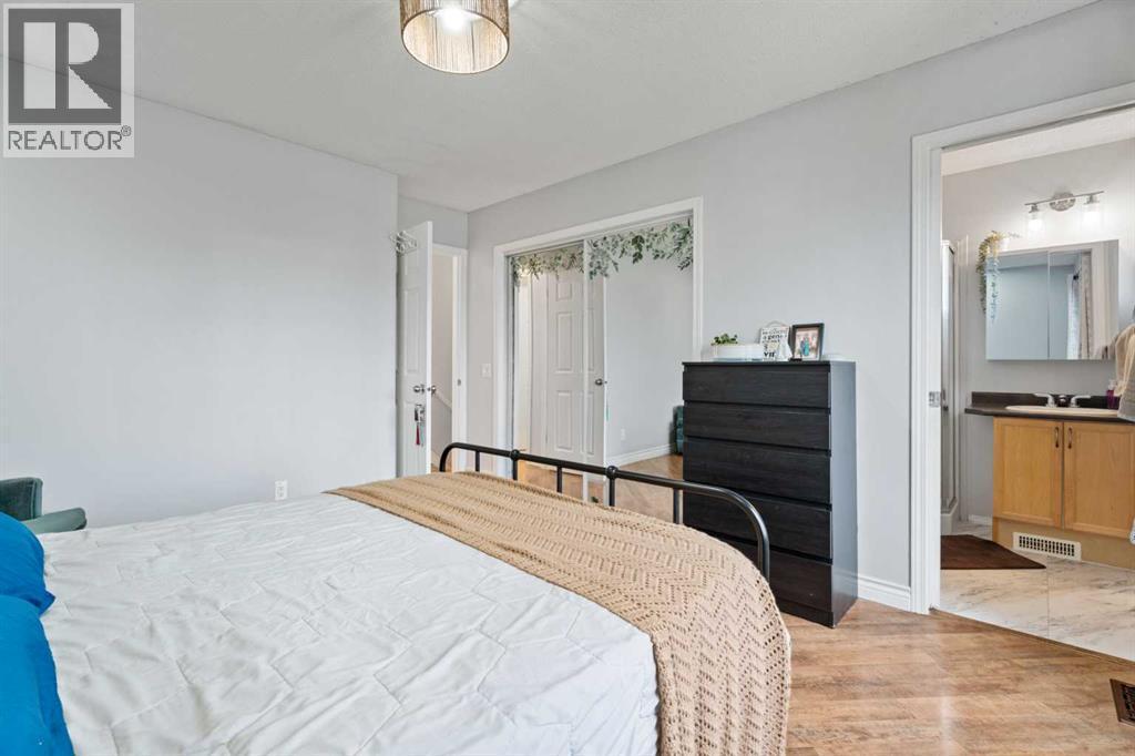 242 Elgin Place Se, Calgary, AB - Indoor Photo Showing Bedroom