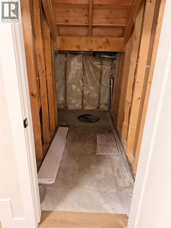 4834 62 Avenue, Taber, AB - Indoor Photo Showing Other Room With Fireplace