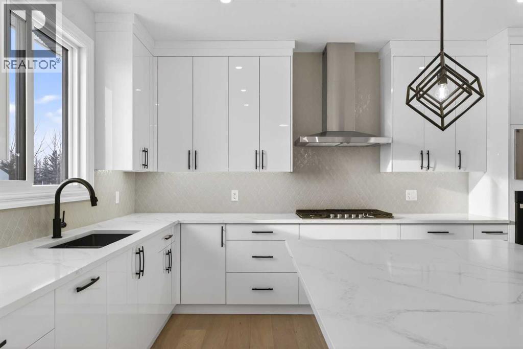 98 Waterford Crescent, Chestermere, AB - Indoor Photo Showing Kitchen With Upgraded Kitchen