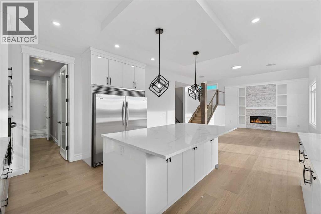 98 Waterford Crescent, Chestermere, AB - Indoor Photo Showing Kitchen With Upgraded Kitchen