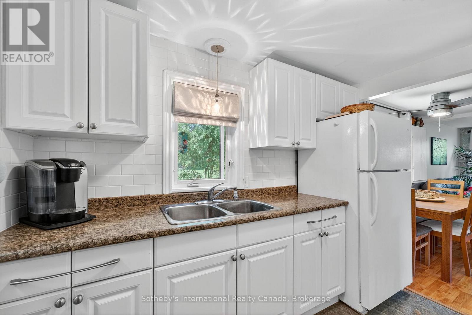Galley kitchen - 14 Domar Road, Tiny, ON - Indoor Photo Showing Kitchen With Double Sink