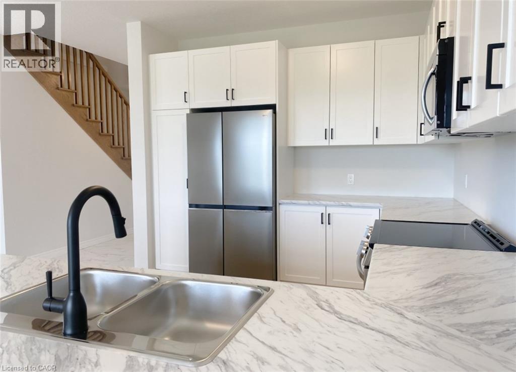 57 Lloyd Davies Way, Binbrook, ON - Indoor Photo Showing Kitchen With Double Sink