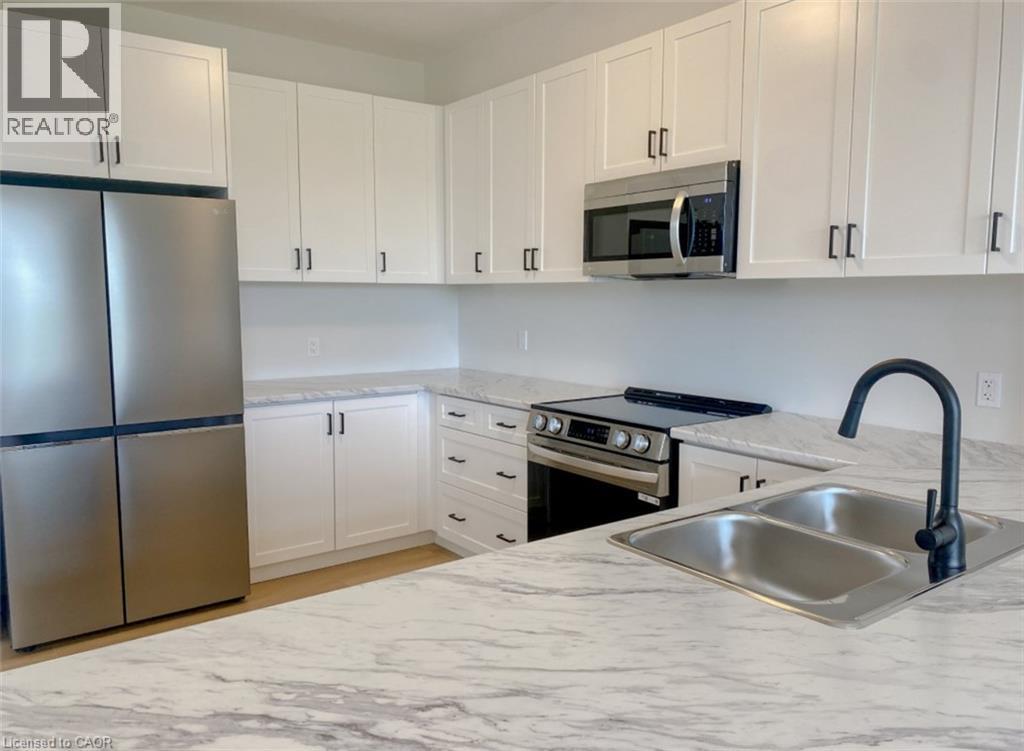 57 Lloyd Davies Way, Binbrook, ON - Indoor Photo Showing Kitchen With Double Sink
