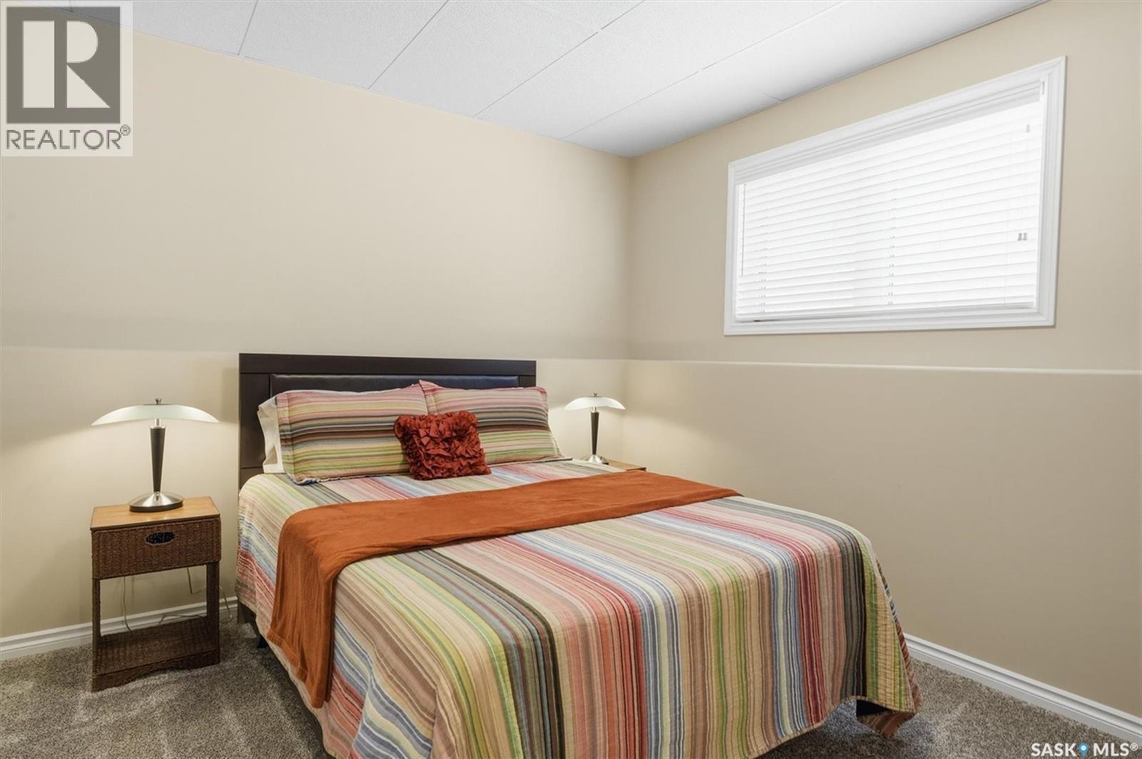 404 Lyle Crescent, Warman, SK - Indoor Photo Showing Bedroom