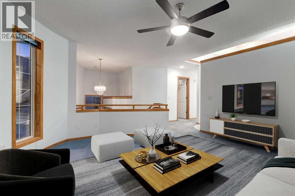 20 Willowbrook Gate Nw, Airdrie, AB - Indoor Photo Showing Living Room