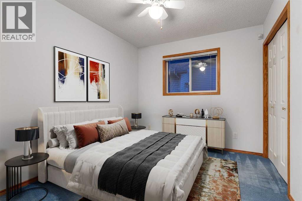 20 Willowbrook Gate Nw, Airdrie, AB - Indoor Photo Showing Bedroom