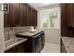 Upstairs washer and dryer with plenty of storage -