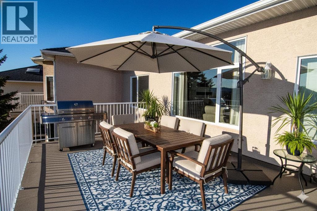 Deck - Virtual Staging - 16 Eagleview Heights Nw, Cochrane, AB - Outdoor With Deck Patio Veranda With Exterior