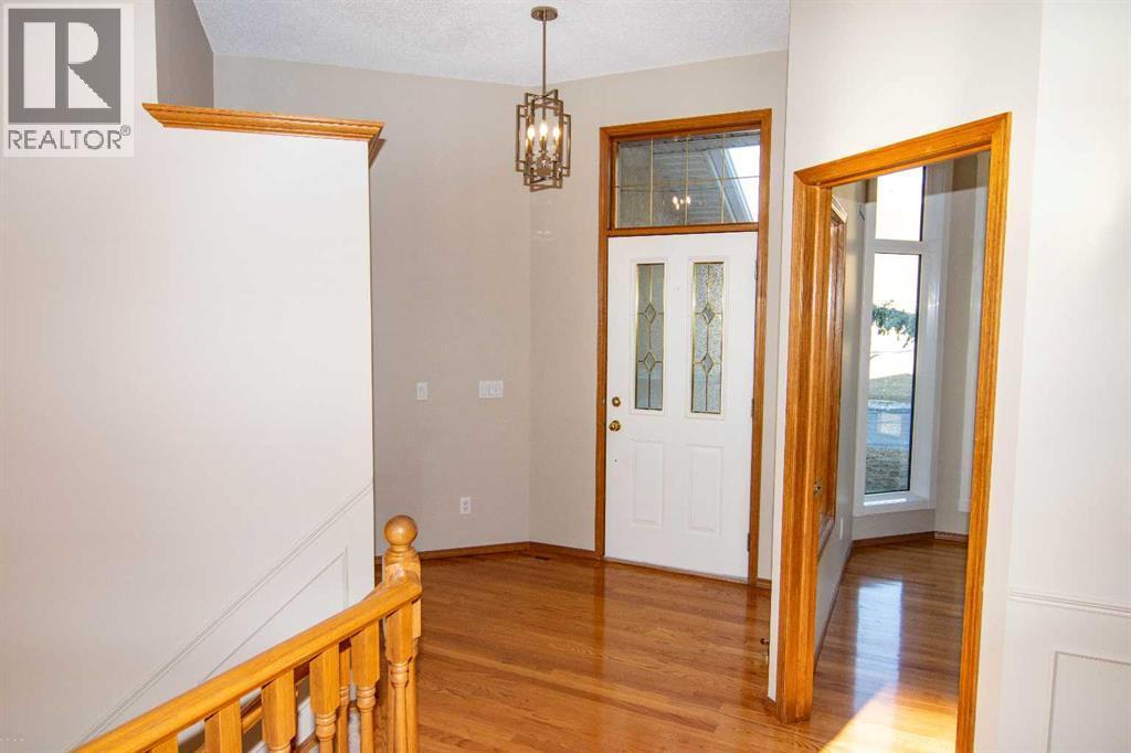Come in.. - 16 Eagleview Heights Nw, Cochrane, AB - Indoor Photo Showing Other Room