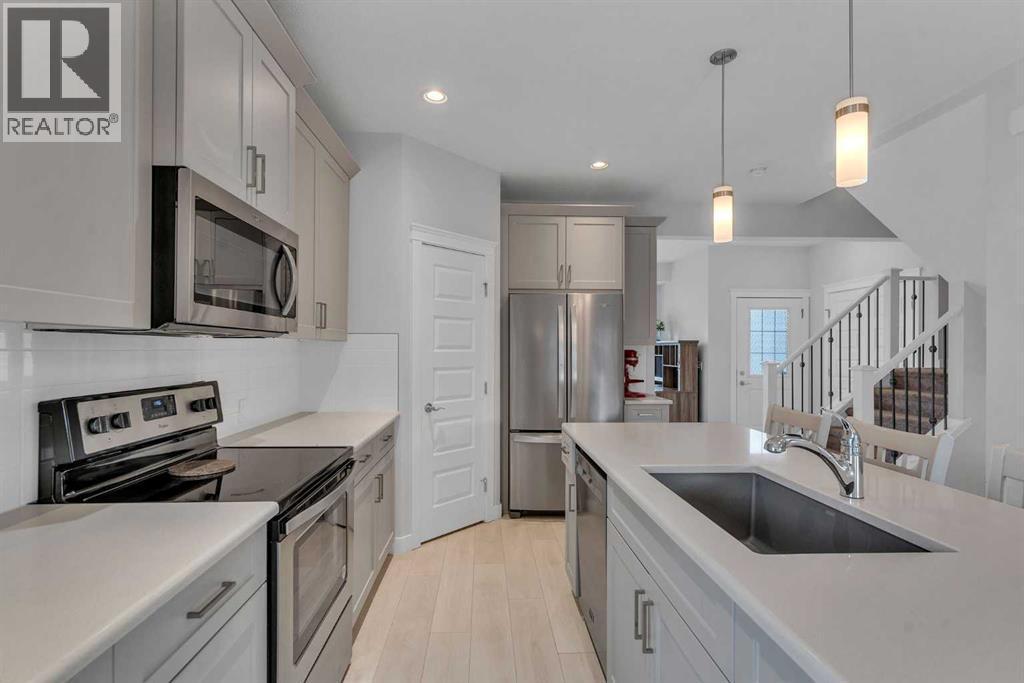 7 Corner Meadows Common Ne, Calgary, AB - Indoor Photo Showing Kitchen With Stainless Steel Kitchen With Upgraded Kitchen