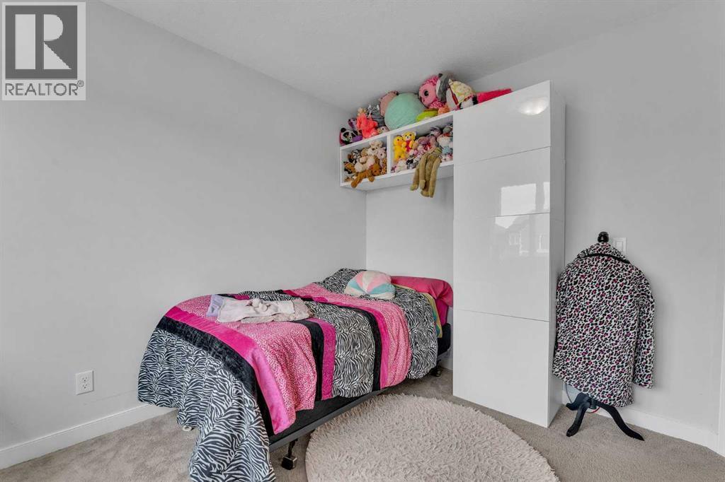 7 Corner Meadows Common Ne, Calgary, AB - Indoor Photo Showing Bedroom