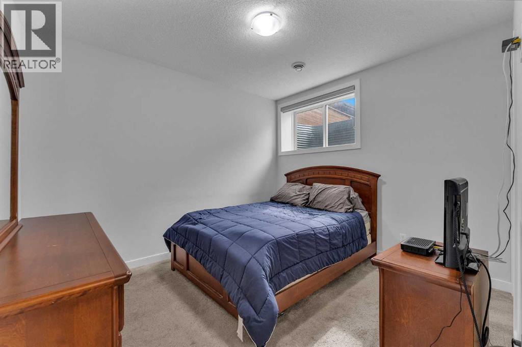 7 Corner Meadows Common Ne, Calgary, AB - Indoor Photo Showing Bedroom