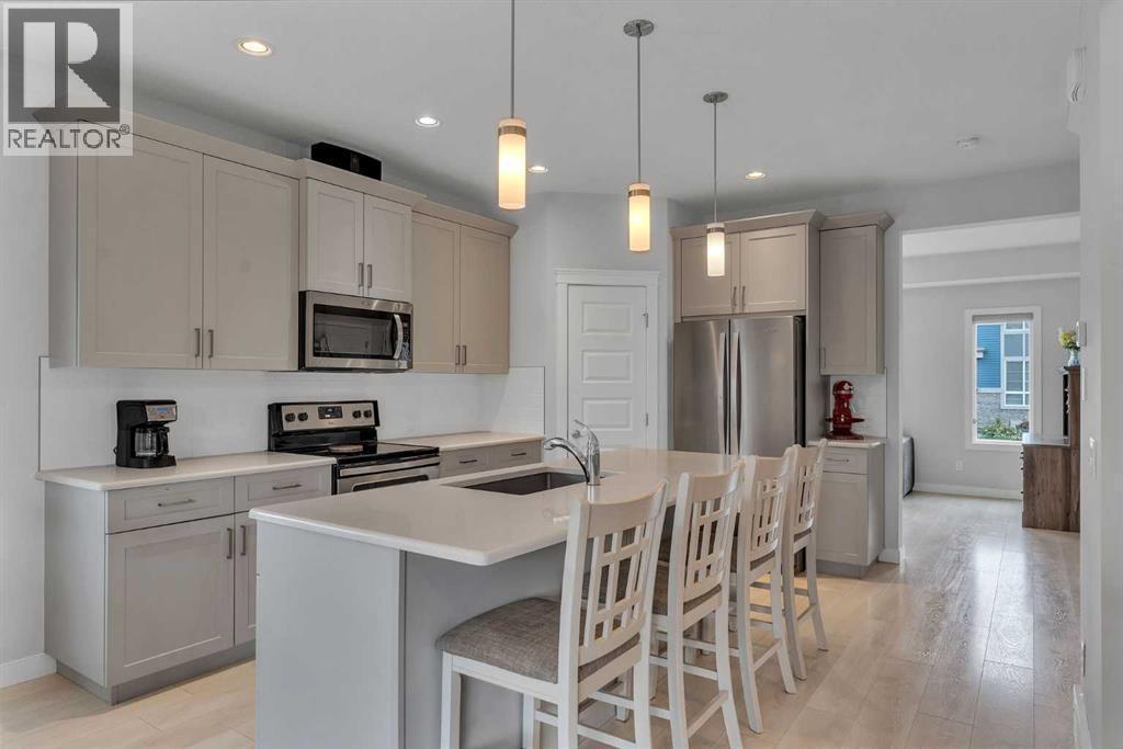 7 Corner Meadows Common Ne, Calgary, AB - Indoor Photo Showing Kitchen With Stainless Steel Kitchen With Upgraded Kitchen