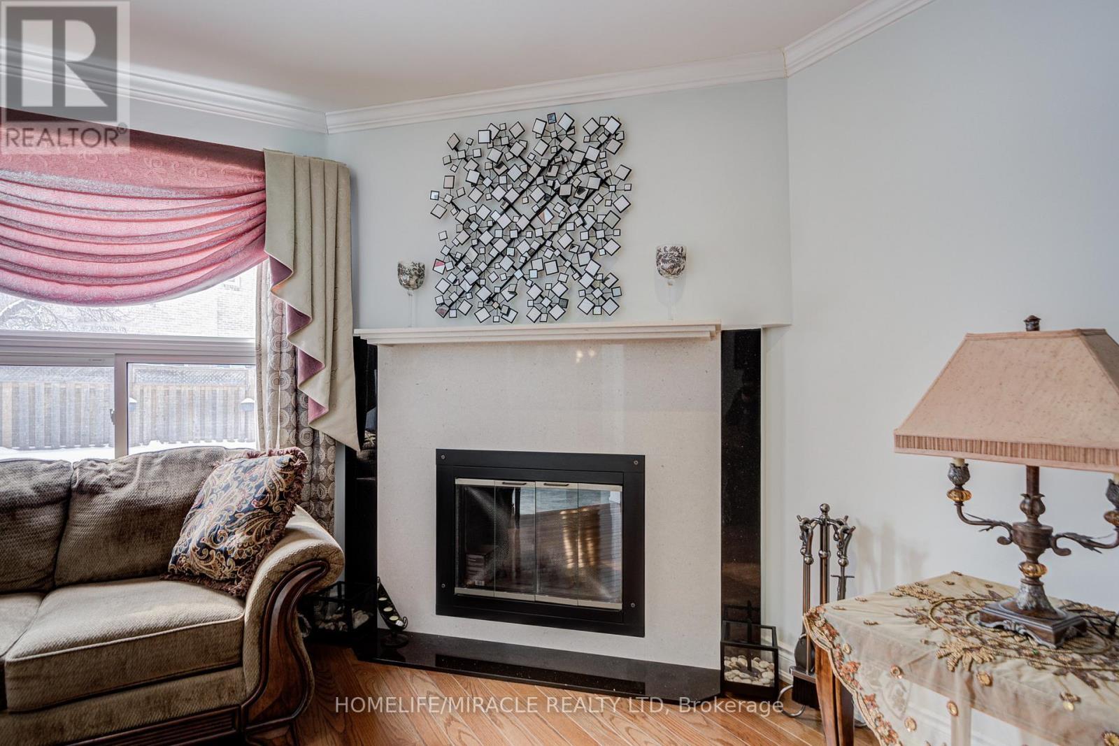 5128 Guildwood Way, Mississauga, ON - Indoor Photo Showing Living Room With Fireplace