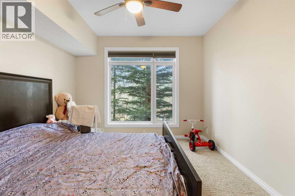 8103, 14 Hemlock Crescent Sw, Calgary, AB - Indoor Photo Showing Bedroom