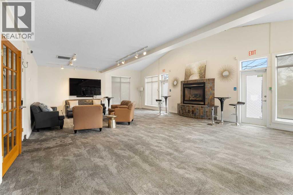 8103, 14 Hemlock Crescent Sw, Calgary, AB - Indoor With Fireplace