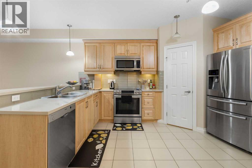 8103, 14 Hemlock Crescent Sw, Calgary, AB - Indoor Photo Showing Kitchen With Stainless Steel Kitchen With Double Sink