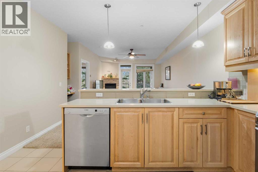 8103, 14 Hemlock Crescent Sw, Calgary, AB - Indoor Photo Showing Kitchen With Double Sink