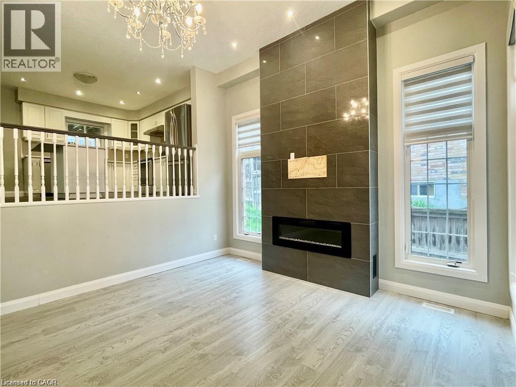 229 Sunny Meadow Court, Kitchener, ON - Indoor With Fireplace