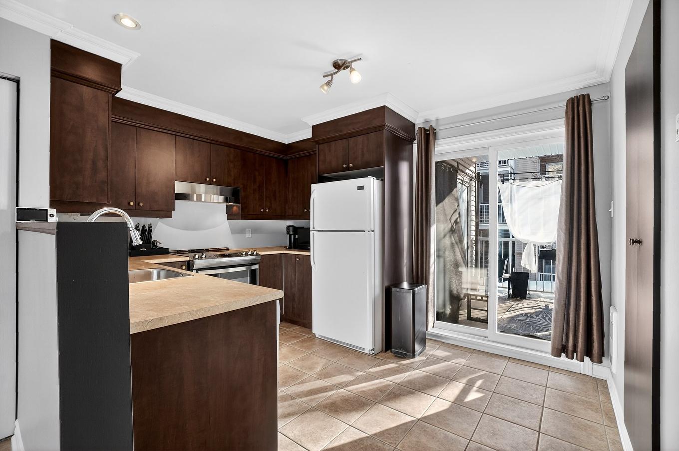 Kitchen - 202-5340 Rue Du Bocage, Terrebonne (La Plaine), QC - Indoor Photo Showing Kitchen