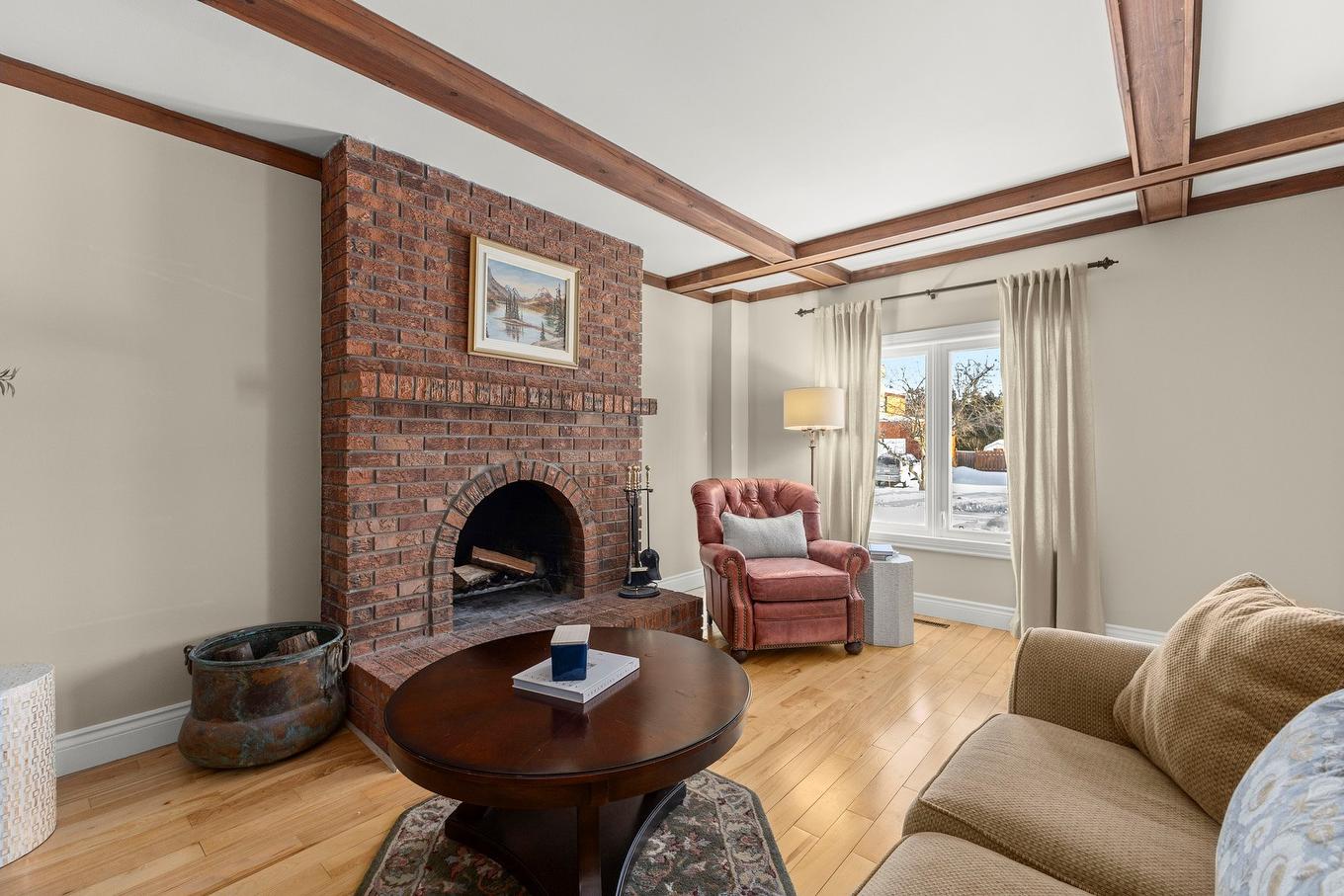 Den - 28 Rue Eaton, Kirkland, QC - Indoor Photo Showing Living Room With Fireplace
