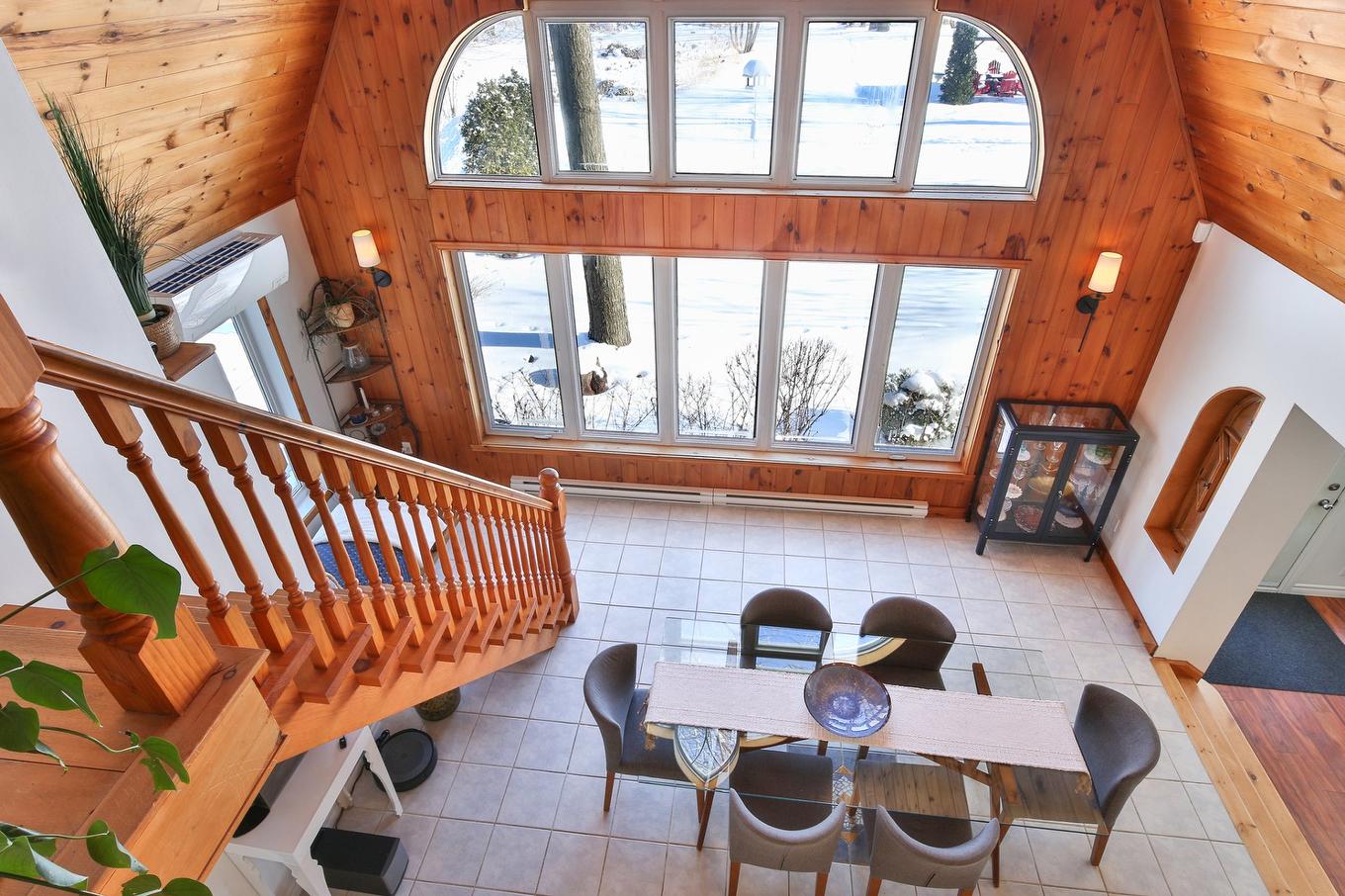 Dining room - 1460 Rue Sheridan, Saint-Jean-Sur-Richelieu, QC - Indoor Photo Showing Other Room With Fireplace