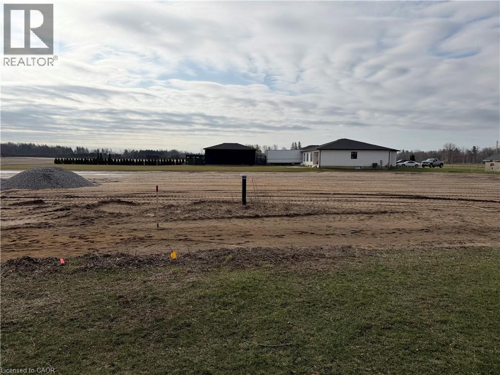 View of yard with an outbuilding and a pole building - 6 Priddle Drive, Langton, ON