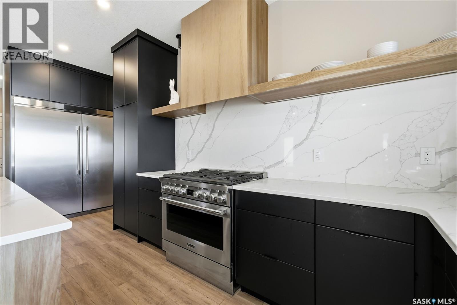 13 Plains Green, Pilot Butte, SK - Indoor Photo Showing Kitchen With Upgraded Kitchen