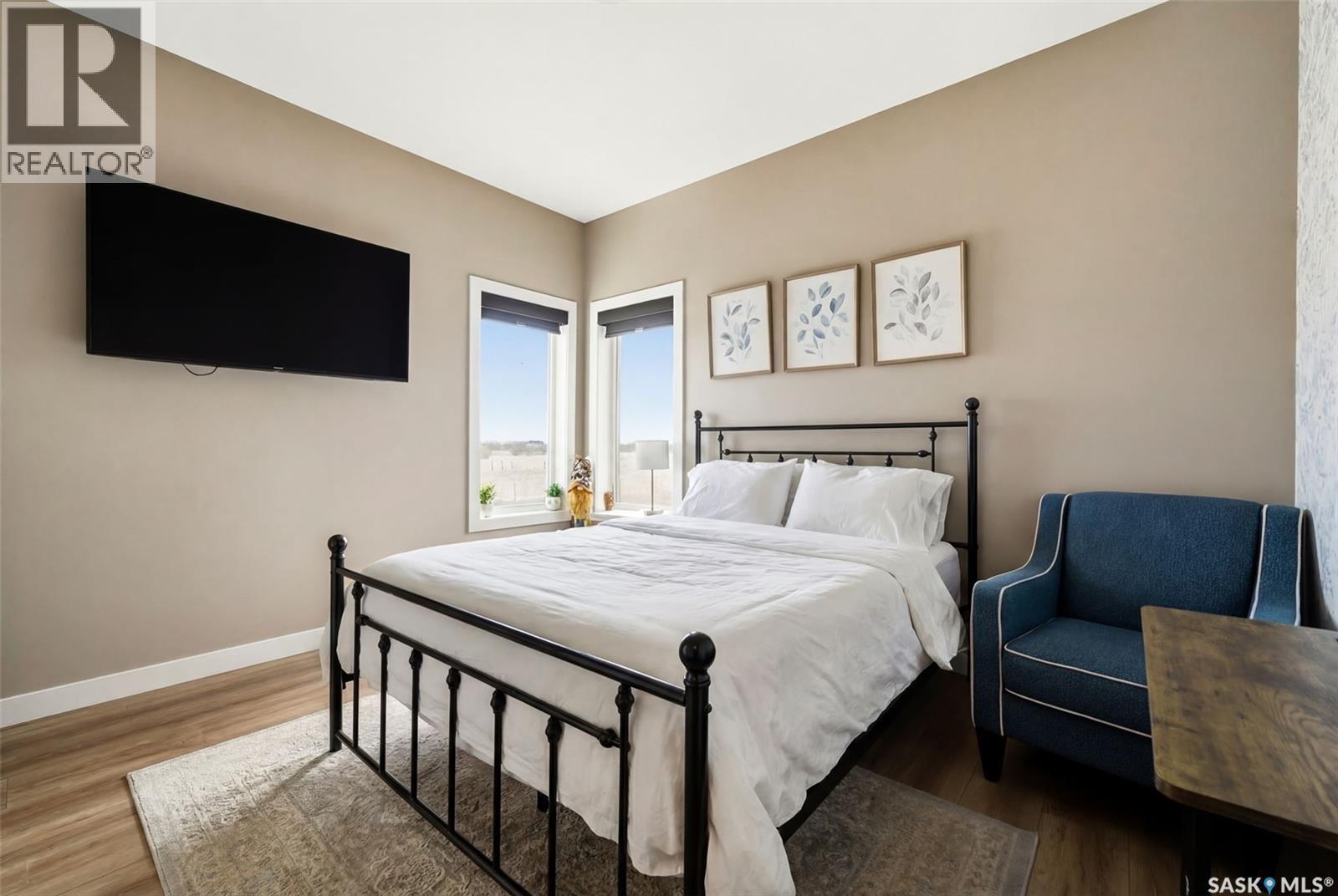 13 Plains Green, Pilot Butte, SK - Indoor Photo Showing Bedroom