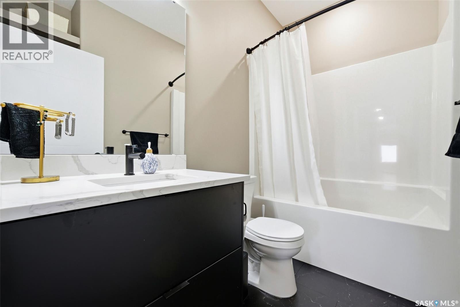 13 Plains Green, Pilot Butte, SK - Indoor Photo Showing Bathroom