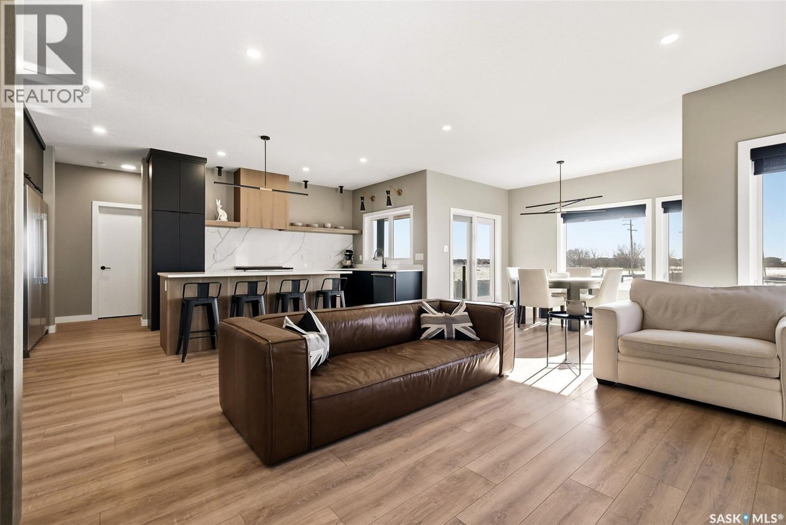 13 Plains Green, Pilot Butte, SK - Indoor Photo Showing Living Room