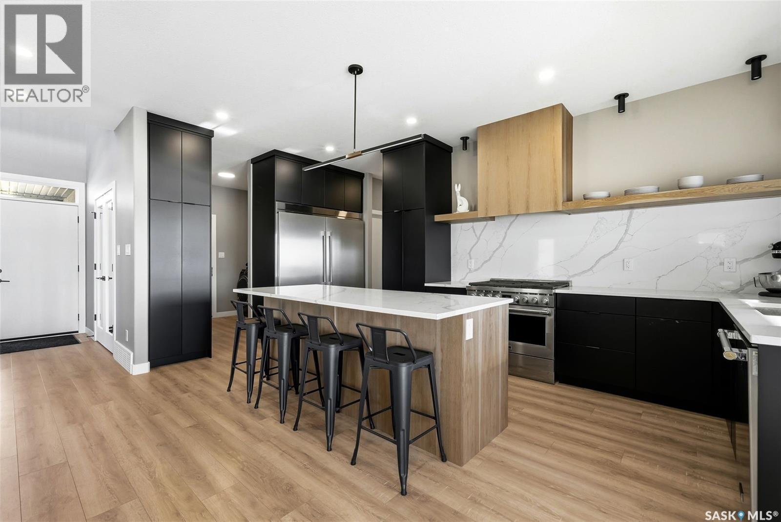 13 Plains Green, Pilot Butte, SK - Indoor Photo Showing Kitchen With Upgraded Kitchen