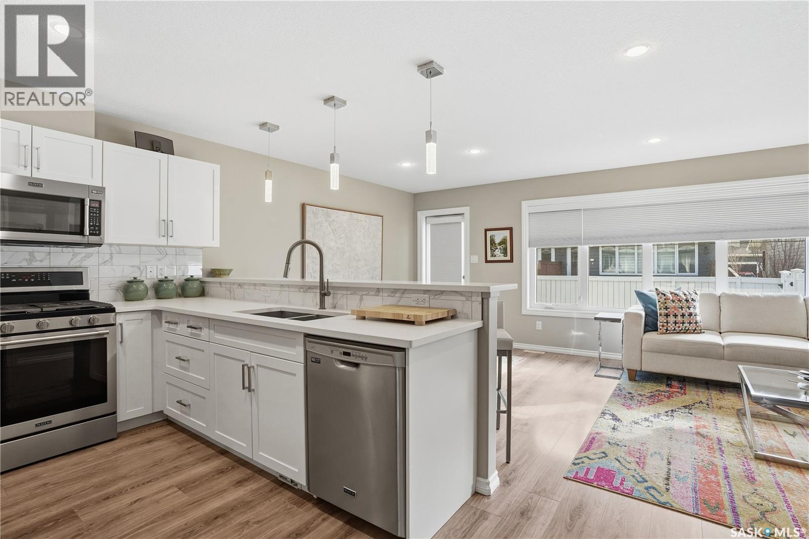 341 4000 Sandhill Crescent, Regina, SK - Indoor Photo Showing Kitchen With Double Sink