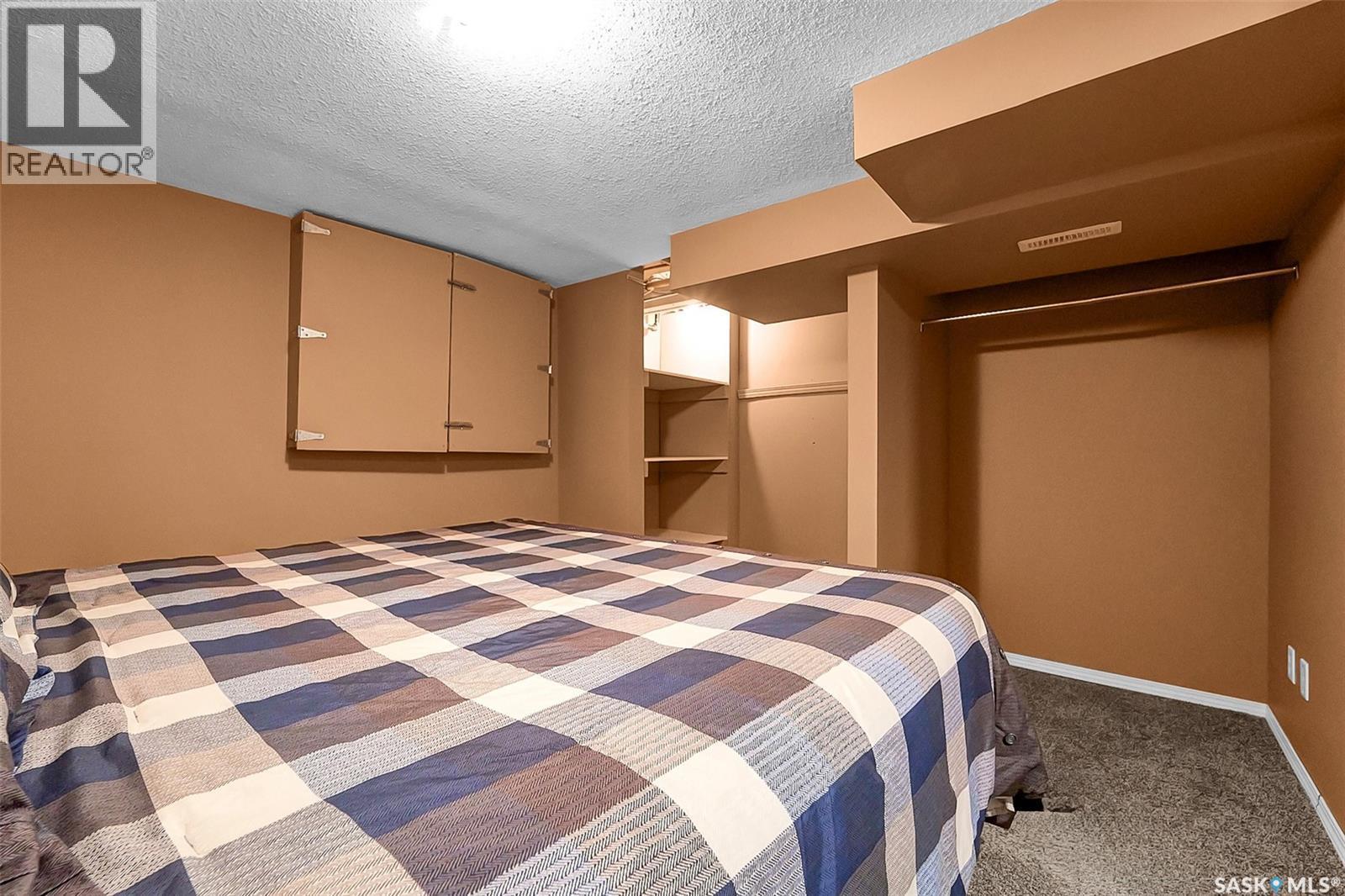 207 5Th Avenue E, Biggar, SK - Indoor Photo Showing Bedroom