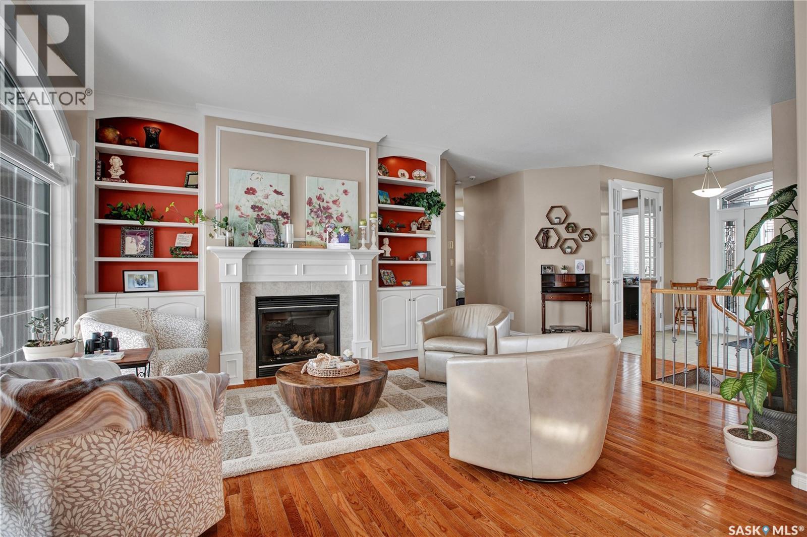910 Roth Terrace, Rosthern, SK - Indoor Photo Showing Living Room With Fireplace