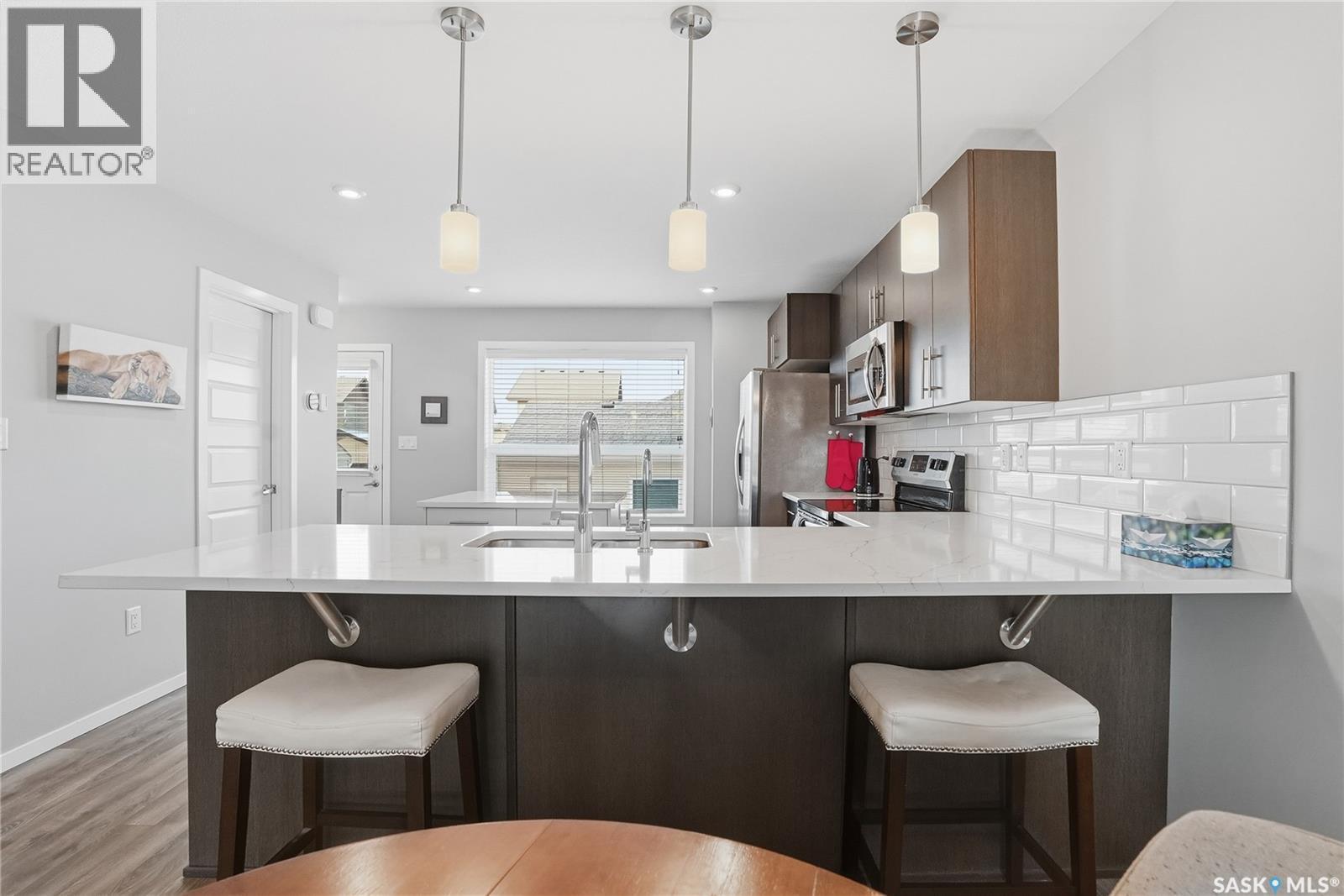 4126 Brighton Circle, Saskatoon, SK - Indoor Photo Showing Kitchen With Upgraded Kitchen