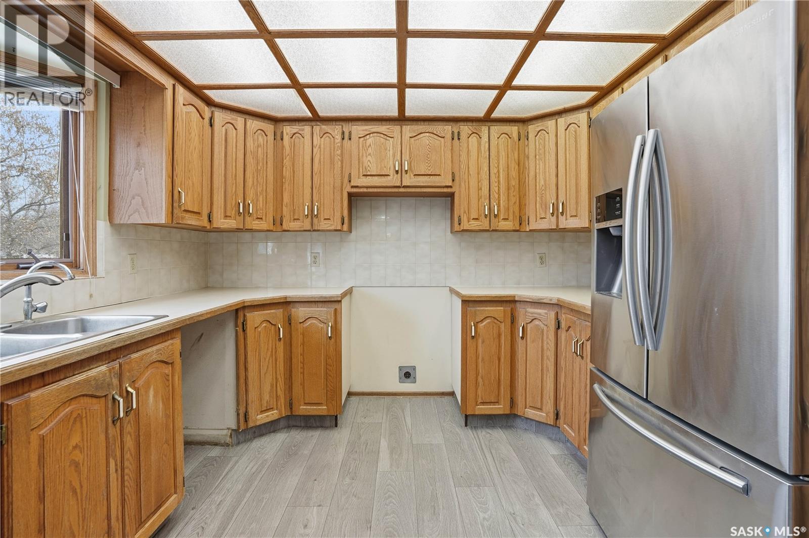 3418 Keohan Crescent, Regina, SK - Indoor Photo Showing Kitchen With Double Sink