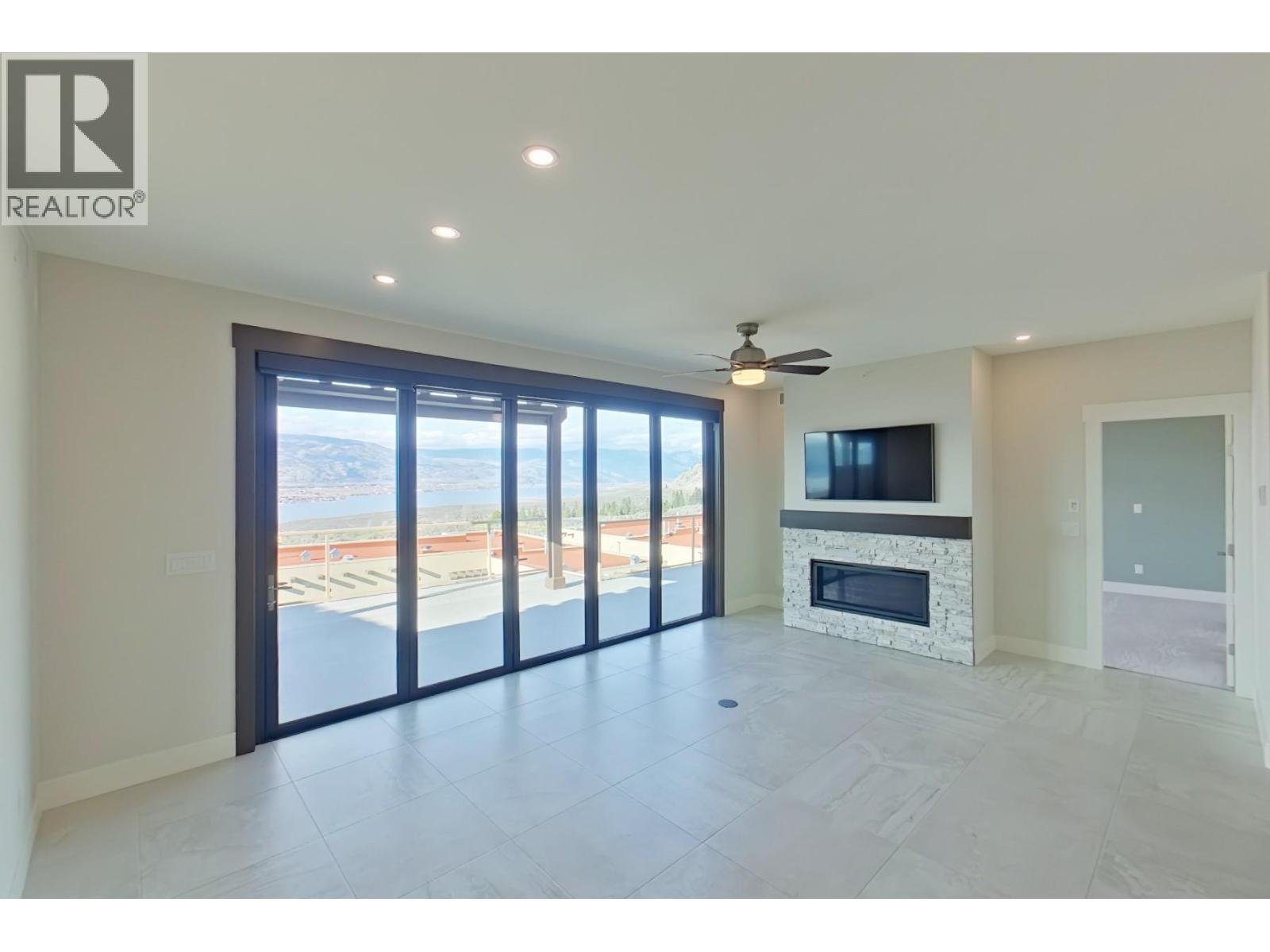 2000 Valleyview Drive Unit# 33, Osoyoos, BC - Indoor With Fireplace