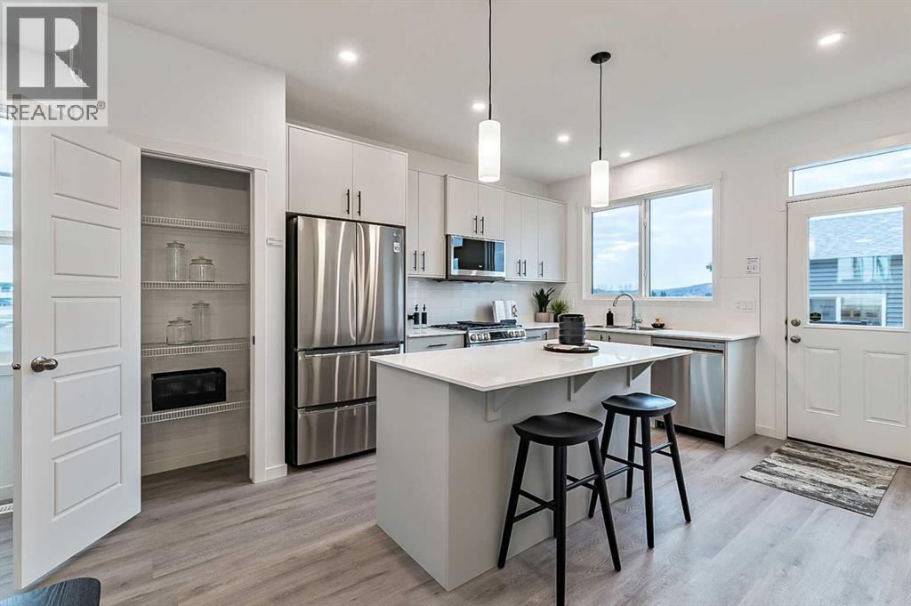 203 Annette Landing, Calgary, AB - Indoor Photo Showing Kitchen With Stainless Steel Kitchen With Upgraded Kitchen