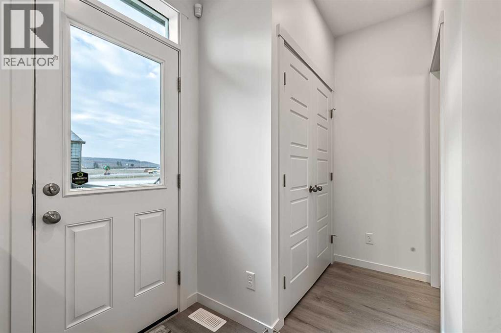 203 Annette Landing, Calgary, AB - Indoor Photo Showing Other Room