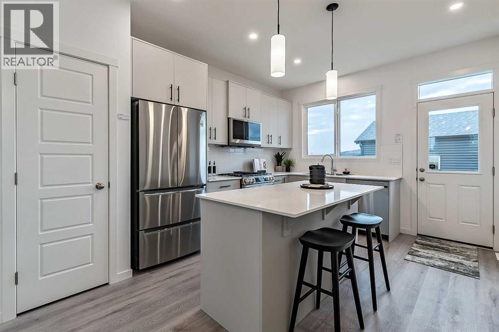 203 Annette Landing, Calgary, AB - Indoor Photo Showing Kitchen With Upgraded Kitchen