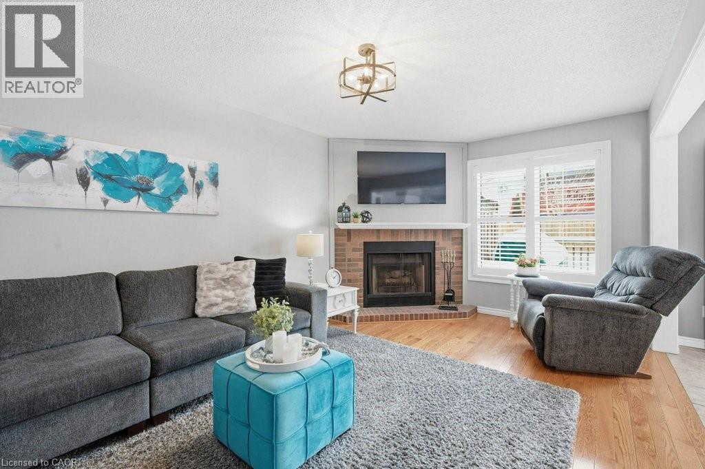 60 Mctague Drive, Cambridge, ON - Indoor Photo Showing Living Room With Fireplace