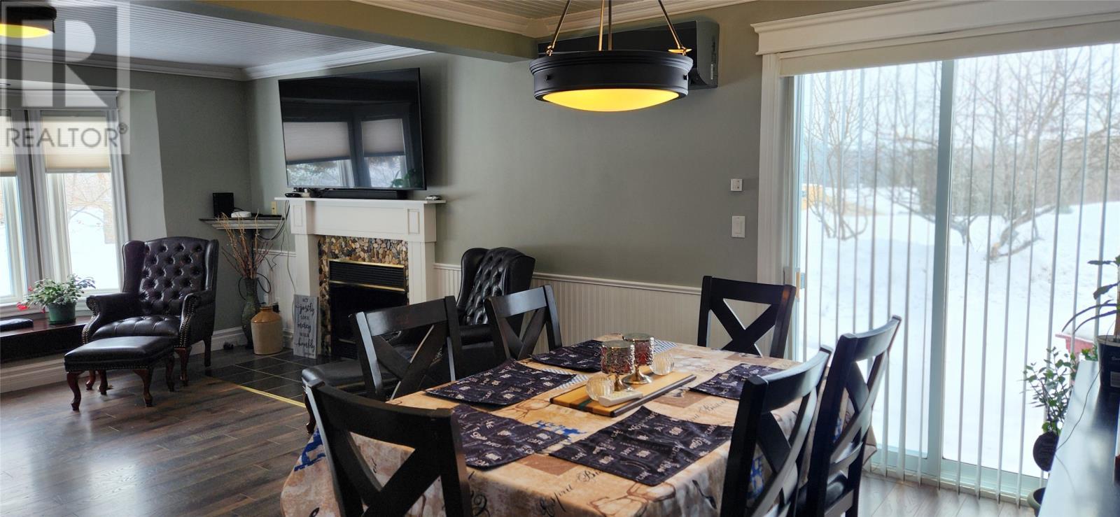 Dining room with patio door - 15 Squires Road, Eastport, NL - Indoor Photo Showing Dining Room